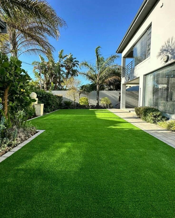 zoysia sod for sale freshly installed on a residential lawn, showcasing dense green blades, shade tolerance, and premium turf quality.